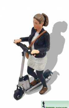 500066 - Woman with e-scooter