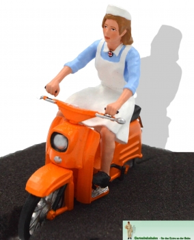Art.No. 500810 - GDR community sister "Egnes" on scooter swallow